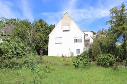 Baugrundstück mit Altbestand Abrisshaus in gewachsener Wohnlage