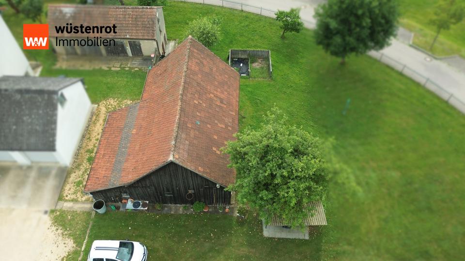 Gebäude- und Freifläche mit Entwicklungsmöglichkeiten in attraktiver Lage zimmer