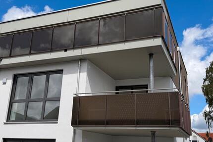 Erstbezug mit Balkon: Schöne, helle 4-Zimmer-Wohnung