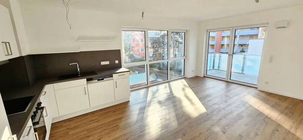 Einziehen und Aufleben - Exklusive 3-Zimmer-Wohnung mit Einbauküche und Balkon und Gartenanteil