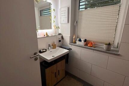 2 -Zimmer-Whg. mit Küche, Abstellraum, Terrasse, Gartenanteil und Stellplätzen zimmer