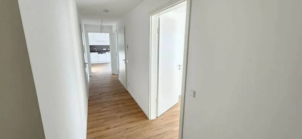 Einziehen und Aufleben - Exklusive 3-Zimmer-Wohnung mit Einbauküche und Balkon und Gartenanteil