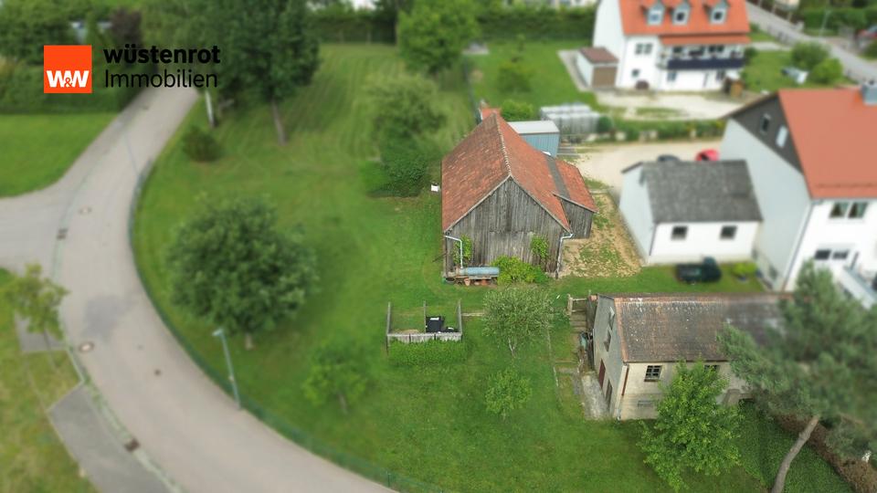 Gebäude- und Freifläche mit Entwicklungsmöglichkeiten in attraktiver Lage zimmer