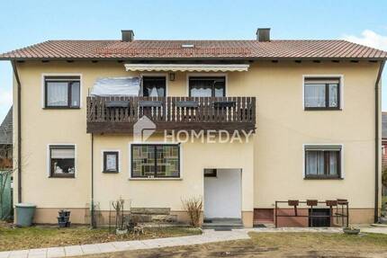 Großzügig & vielseitig: Zweifamilienhaus mit Garten, 2 Garagen und Balkonen in Krondorf