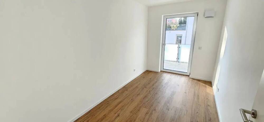 Einziehen und Aufleben - Exklusive 3-Zimmer-Wohnung mit Einbauküche und Balkon und Gartenanteil