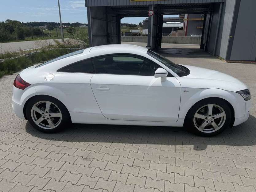 TT