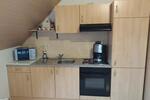 Kleine möblierte Wohnung im Dachgeschoss