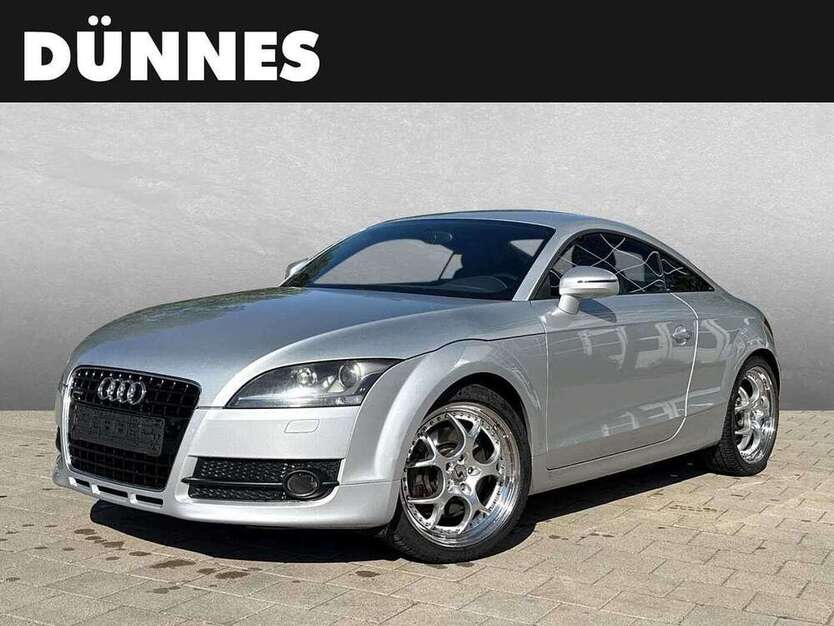 TT